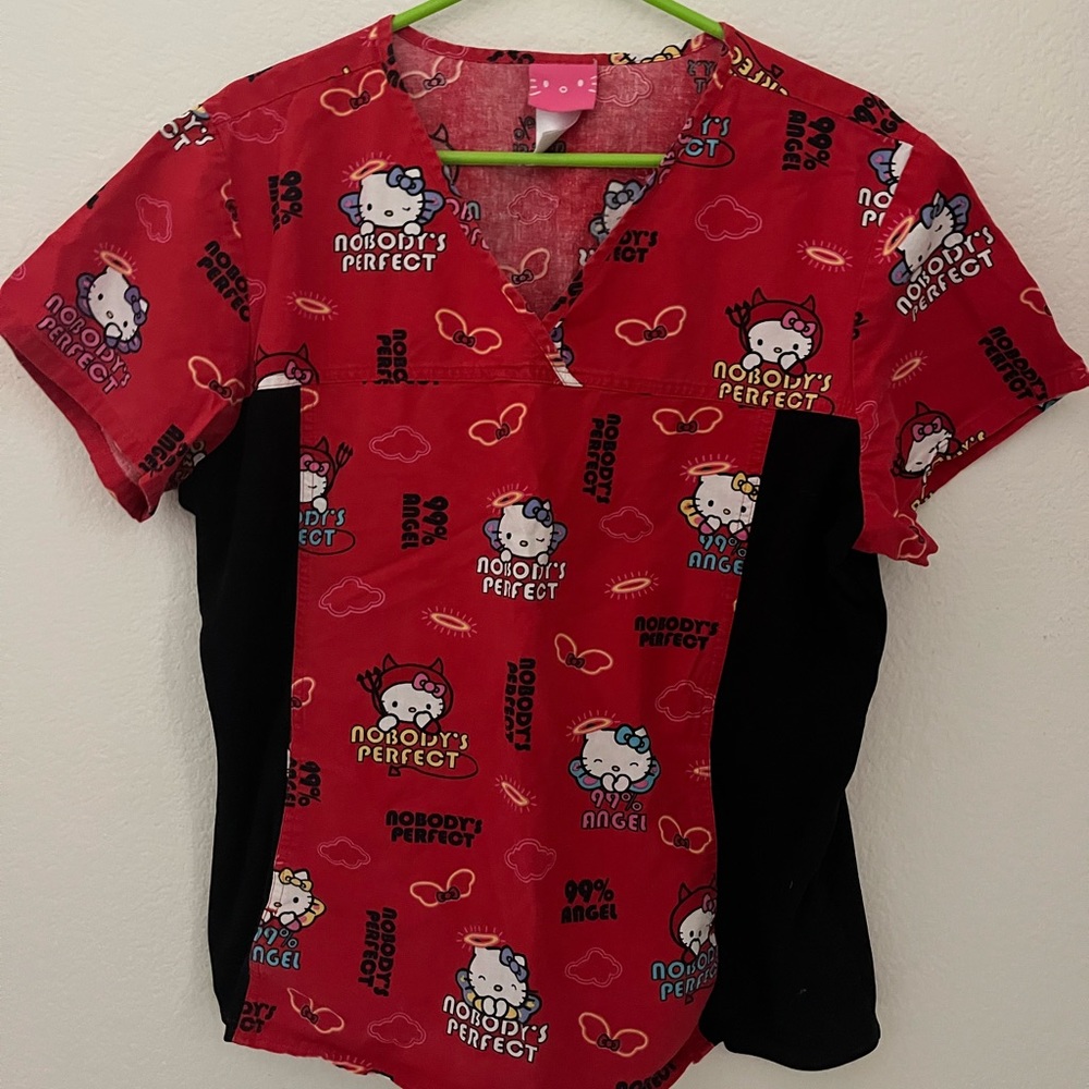 Hello kitty red scrub top med or large